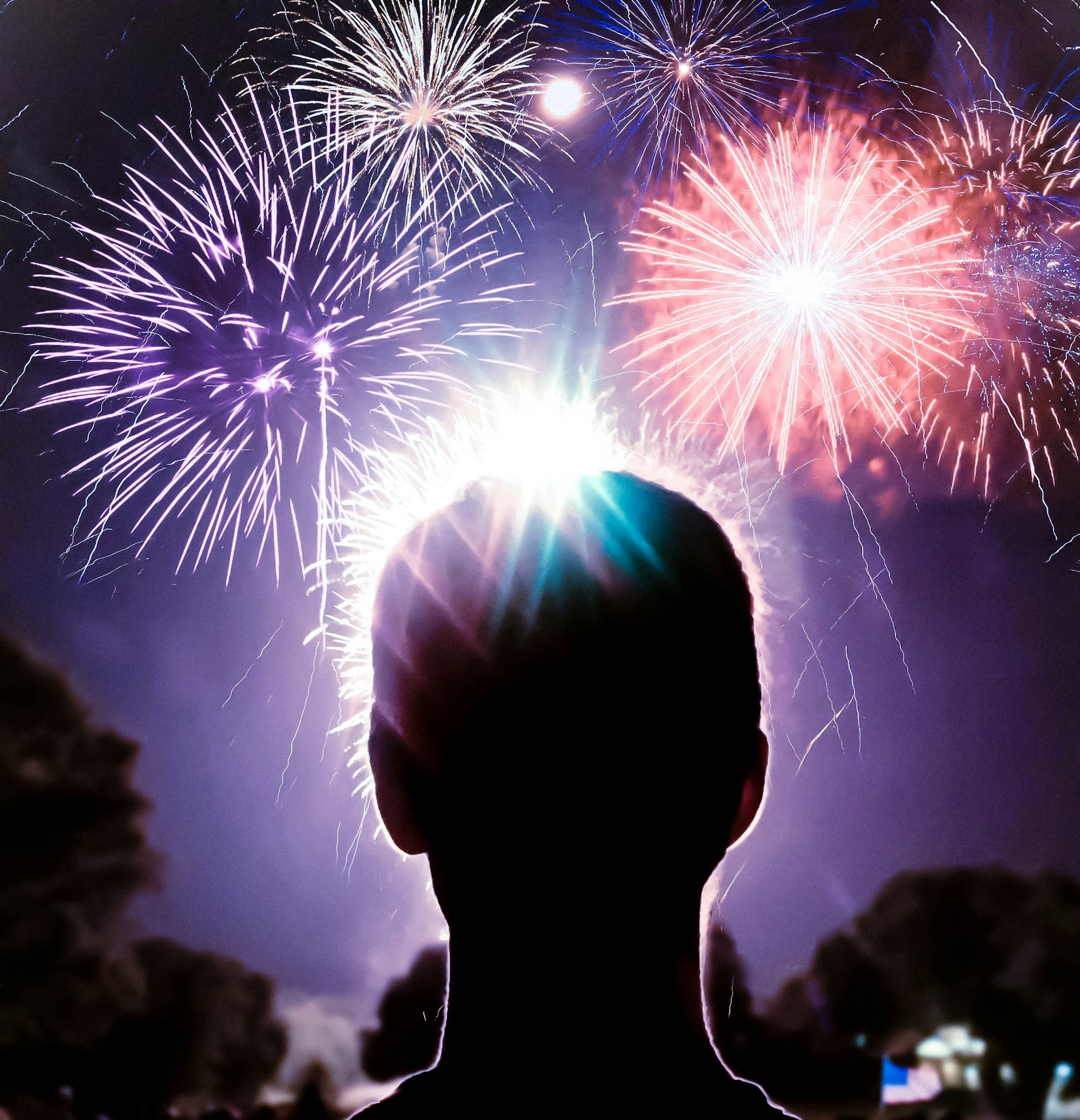 figure watching fireworks