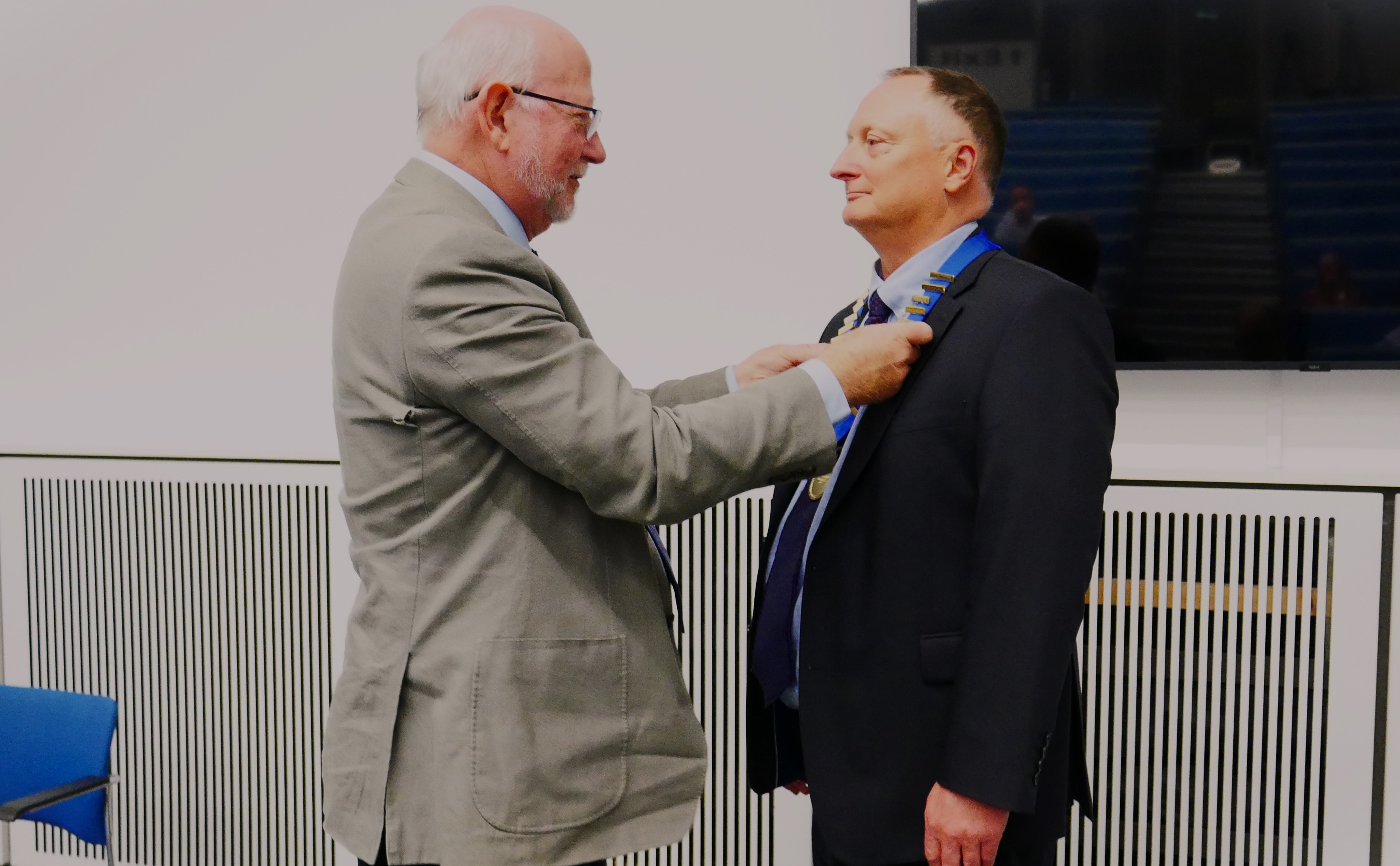 Handover by Allistair Somerville to new President Professor David Waddington
