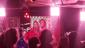 Muscians playing in a small pub venue