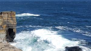 ocean waves off coast of Orkney