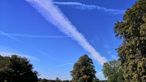 Aircraft contrails in a blue sky